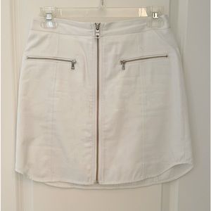 BCBG white mini Skirt, with zippers